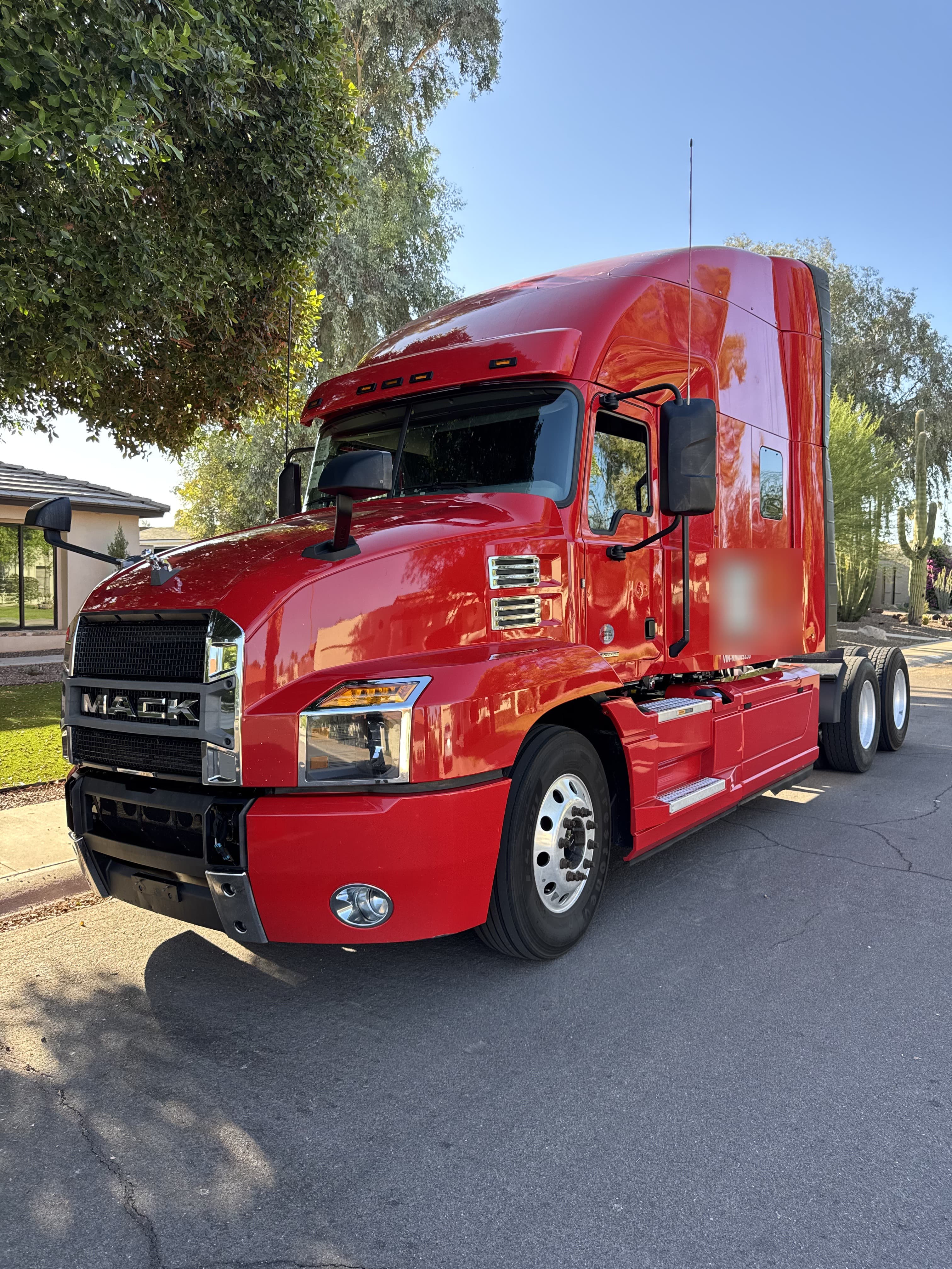 A Mack semi truck secured for an OTR Consulting client